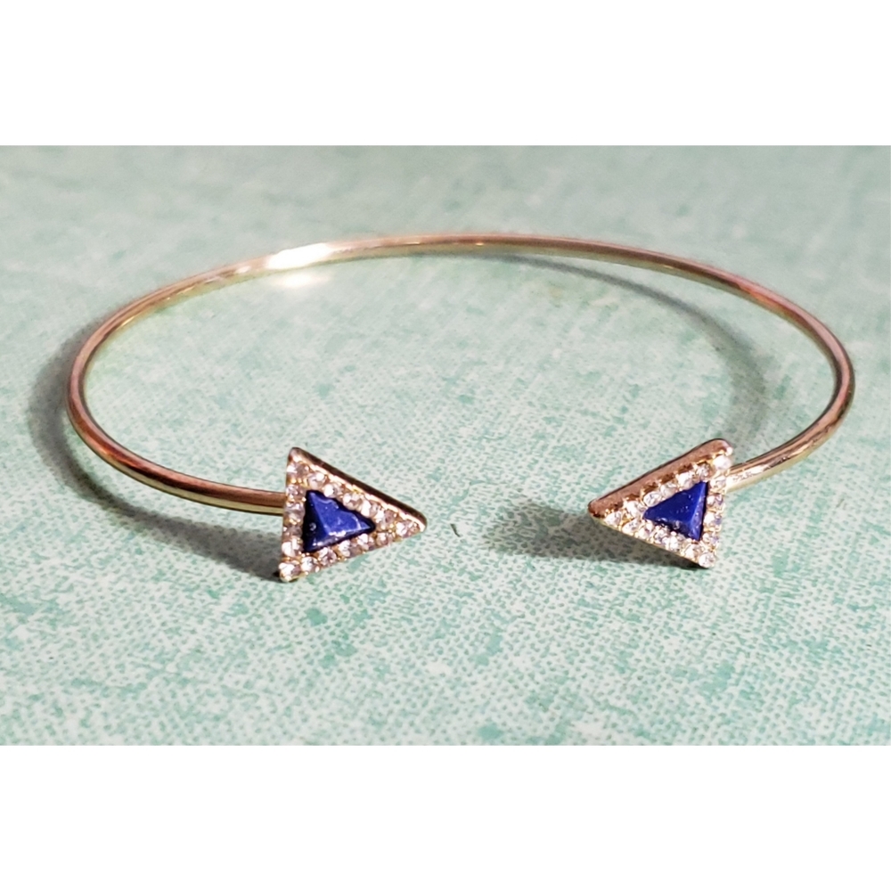 Express thin gold cuff with lapis lazuli stones